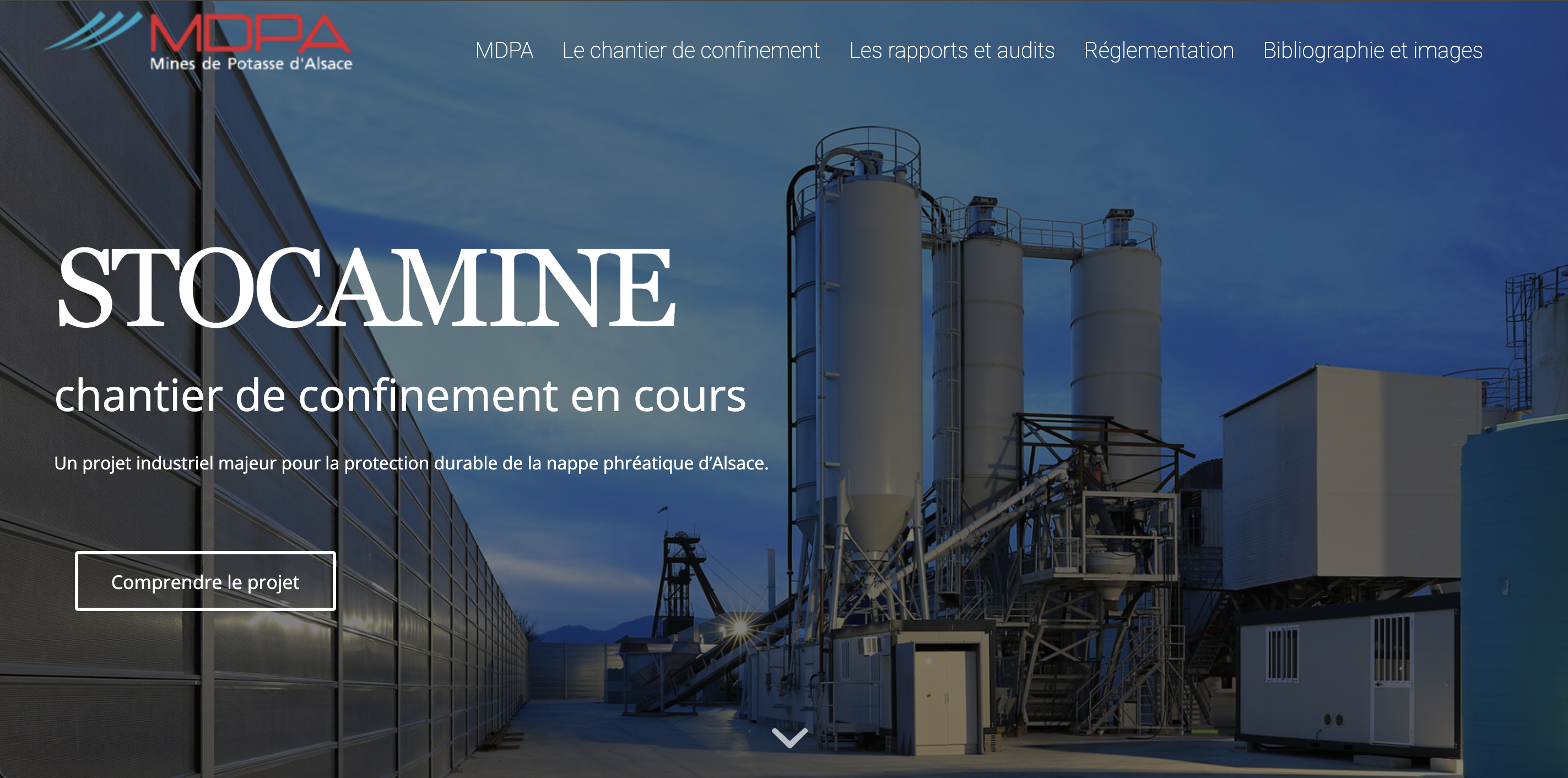 Homepage of the MDPA-Stocamine site, deep navy background, Stocamine title and view of the industrial site.